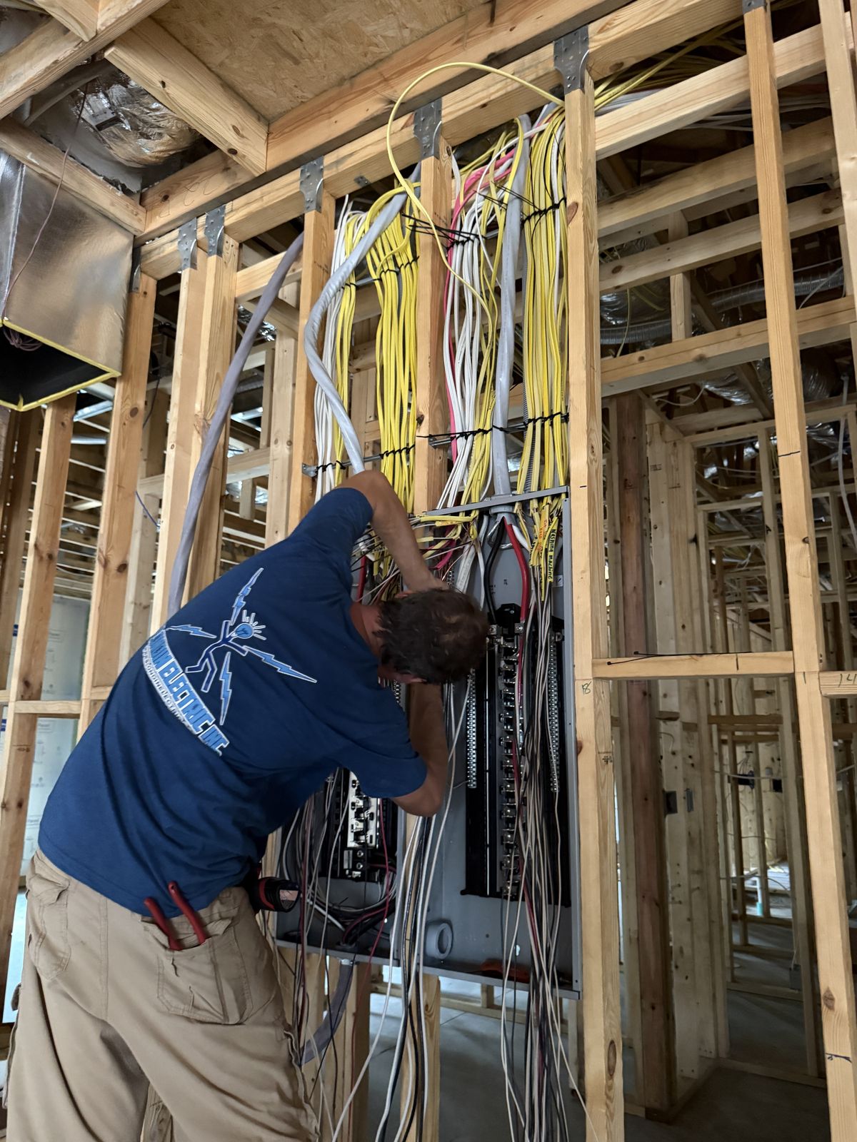 Brian wiring a panel during new construction