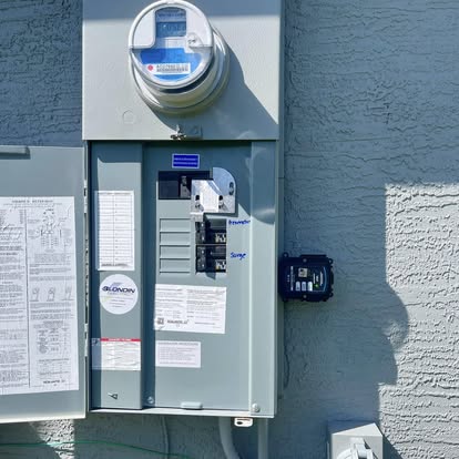 Service upgrade with generator hookup and surge protection